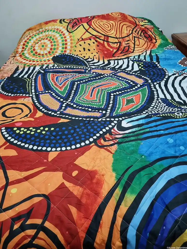 Colorful abstract patterned fabric with vibrant colors on a plain background