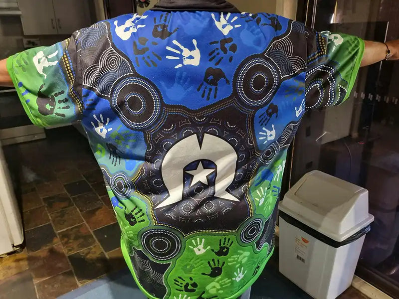 Colorful chair cover with abstract patterns in a kitchen setting