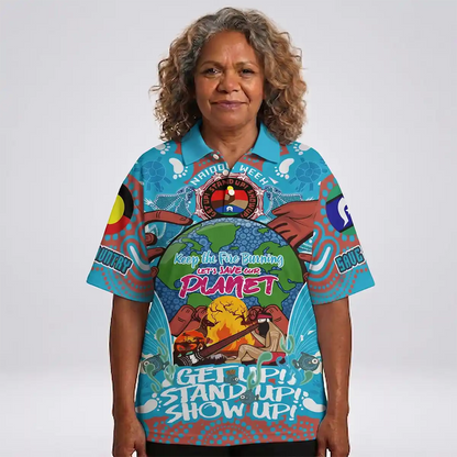 Person wearing a colorful shirt with graphic designs and text on a white background. Australia Naidoc Week 2024 Polo Shirt - Save Our Earth & Keep The Fire Burning 3