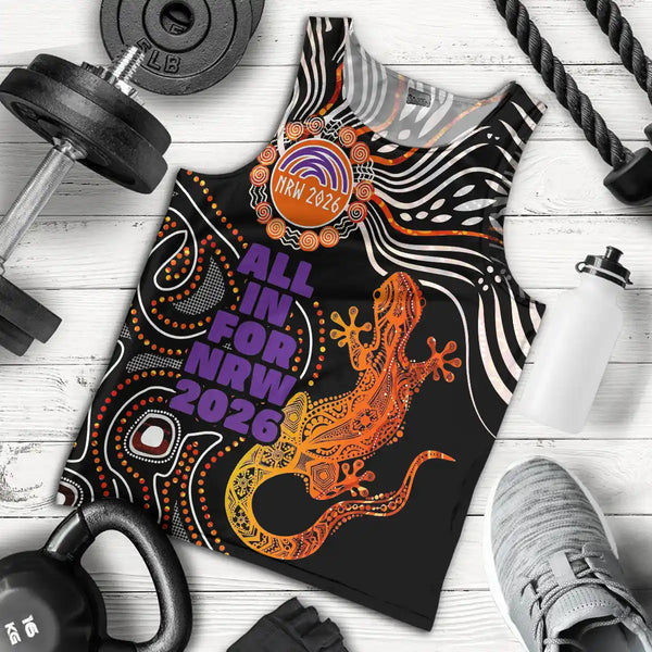 Black tank top with orange lizard design and text 'All in for NRW 2026' on a wooden surface with fitness equipment. NRW 2026 Men's Tank Top & Singlet - All In For NRW Goanna Painting 1