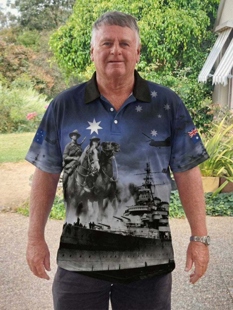 Man wearing a shirt with a graphic design of a soldier on horseback, ship, and Australian flag.