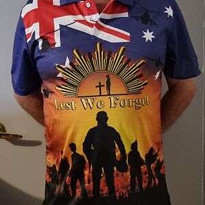 T-shirt with Australian flag and 'Lest We Forget' design on a person wearing it.
