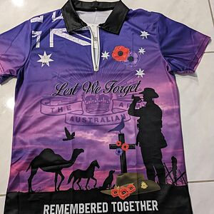 Purple sports jersey with Australian flag, poppy, and silhouette of a soldier on a purple background